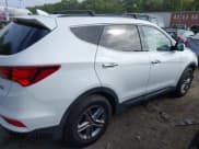 ✅ 2017 Hyundai Santa Fe 2.4L • VIN: 5NMZUDLB1HH002299 • Lot: 43256960. Listed on IAAI with 95,485 mi. Free auction sales archive from the USA and detailed vehicle history report at DreamBid. Image 14.