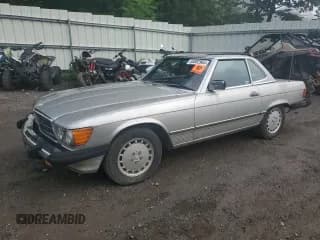 ✅ 1986 Mercedes-Benz 560 SL • VIN: WDBBA48D2GA044461 • Lot: 65802964. Wystawiony na Copart z przebiegiem 128 074 mil. Bezpłatny archiwum sprzedaży aukcyjnych z USA i szczegółowy raport historii pojazdu na DreamBid. Zdjęcie 1.