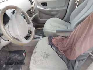 2005 Hyundai Accent GLS с VIN KMHCG45C95U594330, выставлен на аукционе IAAI как лот 42491496 с пробегом 258 170 миль миль и . История ставок и продаж доступна на DreamBid. Изображение 5.