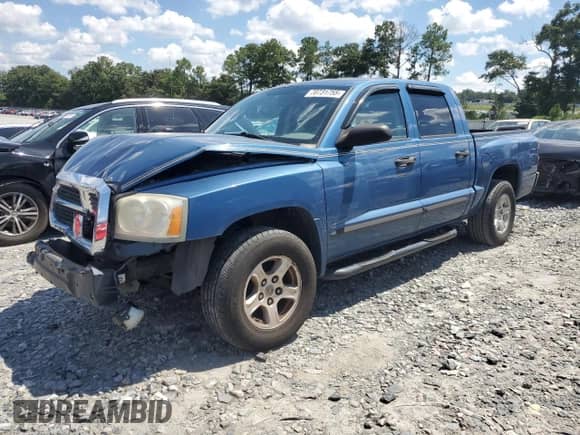 2006 Dodge Dakota SLT z VIN 1D7HE48K66S548914, wystawiony jako Copart lot #70731755 z przebiegiem 138 350 mil mil oraz Szkoda całkowita • Salvage title. Historia ofert i sprzedaży dostępna na DreamBid. Obrazek 1.