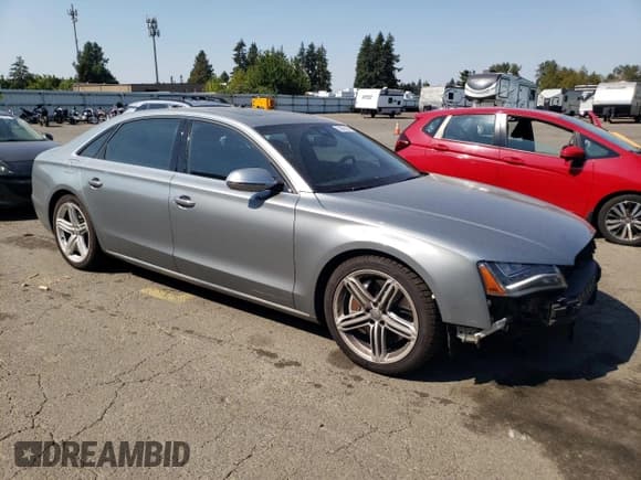 ✅ 2013 Audi A8 4.0L • VIN: WAUR2AFD2DN025490 • Lot: 70553185. Listed on Copart with 77,119 mi. Free auction sales archive from the USA and detailed vehicle history report at DreamBid. Image 4.