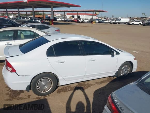 ✅ 2009 Honda Civic • VIN: JHMFA36259S015577 • Lot: 43663762. Listed on IAAI with 127,353 mi. Free auction sales archive from the USA and detailed vehicle history report at DreamBid. Image 13.