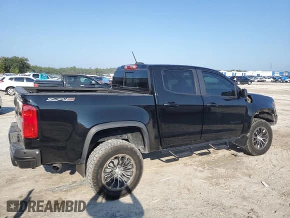 ✅ 2022 Chevrolet Colorado 4WD ZR2 • VIN: 1GCGTEEN4N1178440 • Лот: 71869214. Опубликован ранее на Copart с пробегом 39 624 миль. Бесплатный доступ к архиву аукционных продаж из США и подробный отчёт об истории автомобиля на DreamBid. Изображение 3.