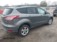 ✅ 2014 Ford Escape SE • VIN: 1FMCU9G9XEUA97228 • Lot: 43735063. Listed on IAAI with 180,870 mi. Free auction sales archive from the USA and detailed vehicle history report at DreamBid. Image 4.