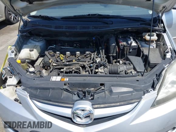 ✅ 2008 Mazda 5 Grand Touring • VIN: JM1CR29L480310627 • Lot: 42065638. Wystawiony na IAAI z przebiegiem 182 358 mil. Bezpłatny archiwum sprzedaży aukcyjnych z USA i szczegółowy raport historii pojazdu na DreamBid. Zdjęcie 10.