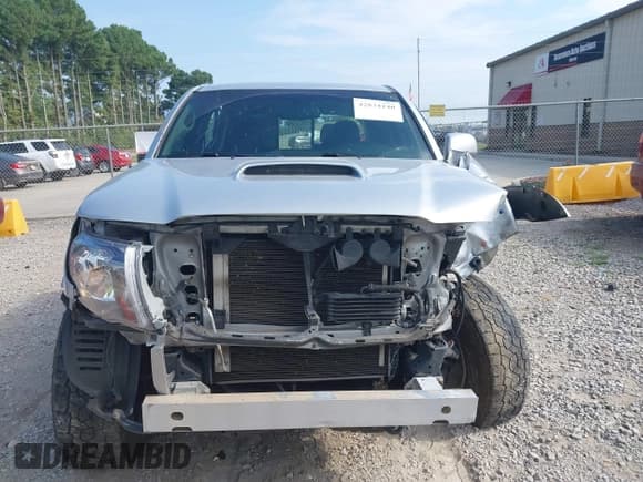 ✅ 2010 Toyota Tacoma PreRunner • VIN: 3TMJU4GN0AM095417 • Lot: 42834140. Listed on IAAI with 166,741 mi. Free auction sales archive from the USA and detailed vehicle history report at DreamBid. Image 13.