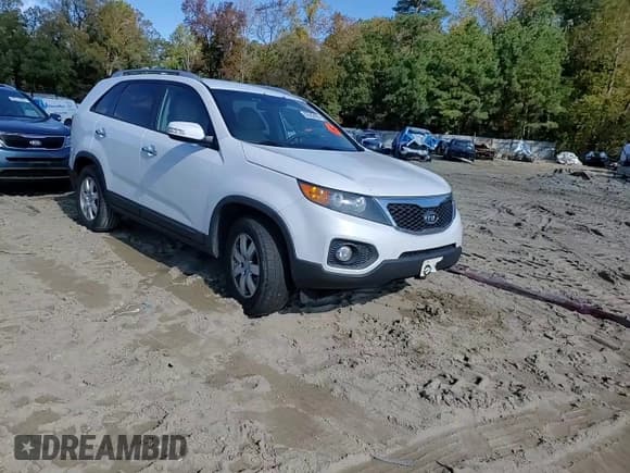 ✅ 2013 Kia Sorento LX • VIN: 5XYKT3A61DG422931 • Lot: 82562425. Listed on Copart with 144,923 mi. Free auction sales archive from the USA and detailed vehicle history report at DreamBid. Image 14.