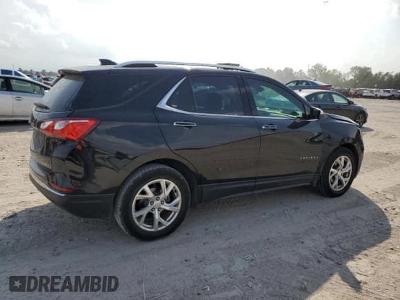 ✅ 2020 Chevrolet Equinox Premier • VIN: 2GNAXNEV7L6275482 • Lot: 87413015. Listed on Copart with 93,079 mi. Free auction sales archive from the USA and detailed vehicle history report at DreamBid. Image 3.