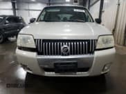 ✅ 2007 Mercury Mariner Premier • VIN: 4M2CU97127KJ20010 • Lot: 52123205. Wystawiony na Copart z przebiegiem 162 337 mil. Bezpłatny archiwum sprzedaży aukcyjnych z USA i szczegółowy raport historii pojazdu na DreamBid. Zdjęcie 5.