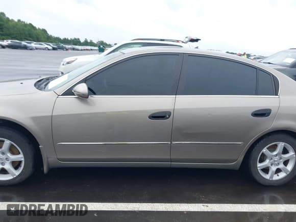 ✅ 2005 Nissan Altima SL • VIN: 1N4AL11E05C107718 • Lot: 42970393. Listed on IAAI with 238,599 mi. Free auction sales archive from the USA and detailed vehicle history report at DreamBid. Image 15.