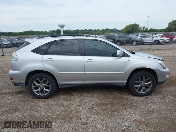 ✅ 2009 Lexus RX 350 • VIN: 2T2HK31U09C099028 • Lot: 43261581. Listed on IAAI with 140,219 mi. Free auction sales archive from the USA and detailed vehicle history report at DreamBid. Image 13.