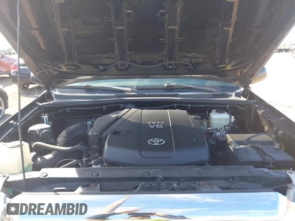 ✅ 2015 Toyota Tacoma • VIN: 3TMLU4EN2FM169326 • Lot: 40689500. Listed on IAAI with 77,003 mi. Free auction sales archive from the USA and detailed vehicle history report at DreamBid. Image 10.