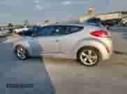 2012 Hyundai Veloster w/Gray Int с VIN KMHTC6AD3CU020065, выставлен на аукционе Copart как лот 80550225 с пробегом 249 792 миль миль и Чистый • Clean title. История ставок и продаж доступна на DreamBid. Изображение 2.