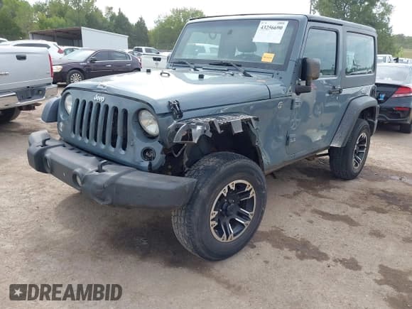 ✅ 2015 Jeep Wrangler Sport • VIN: 1C4AJWAG8FL723991 • Lot: 43256690. Listed on IAAI with 131,170 mi. Free auction sales archive from the USA and detailed vehicle history report at DreamBid. Image 2.