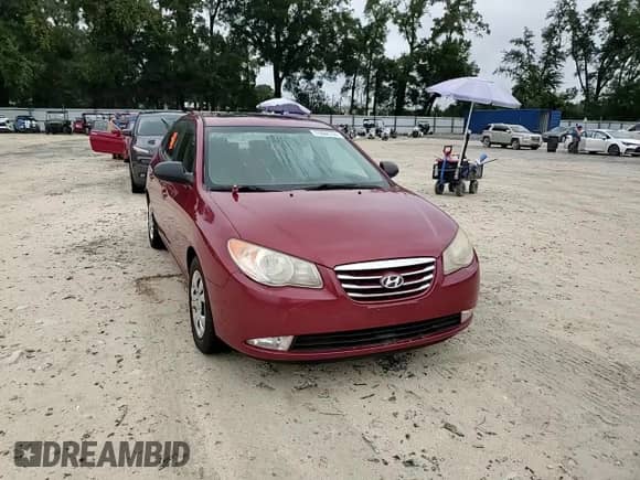 2010 Hyundai Elantra GLS z VIN KMHDU4ADXAU080993, wystawiony jako Copart lot #74888784 z przebiegiem Nie podano mil oraz Szkoda całkowita • Salvage title. Historia ofert i sprzedaży dostępna na DreamBid. Obrazek 10.