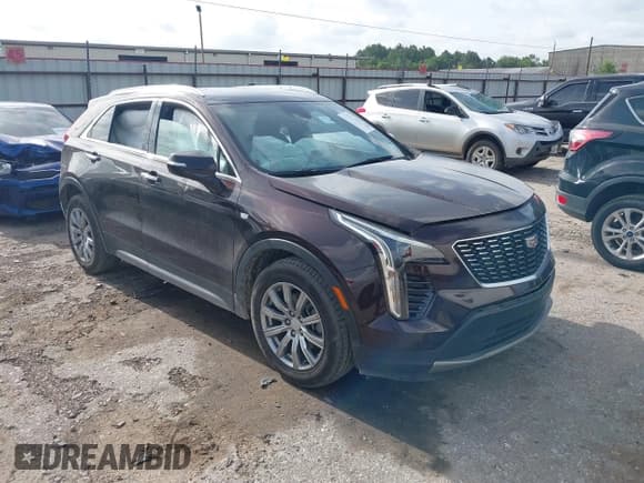 ✅ 2021 Cadillac XT4 FWD Premium Luxury • VIN: 1GYFZCR48MF002387 • Лот: 42752132. Опубликован ранее на IAAI с пробегом 106 859 миль. Бесплатный доступ к архиву аукционных продаж из США и подробный отчёт об истории автомобиля на DreamBid. Изображение 1.
