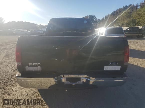 ✅ 2001 Ford F-150 • VIN: 2FTZX17221CA27274 • Lot: 77949204. Listed on Copart with Not provided. Free auction sales archive from the USA and detailed vehicle history report at DreamBid. Image 6.