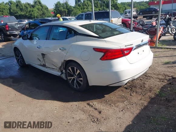 ✅ 2016 Nissan Maxima SR • VIN: 1N4AA6AP9GC390031 • Lot: 42801765. Wystawiony na IAAI z przebiegiem 104 722 mil. Bezpłatny archiwum sprzedaży aukcyjnych z USA i szczegółowy raport historii pojazdu na DreamBid. Zdjęcie 3.