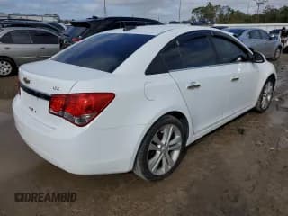 ✅ 2015 Chevrolet Cruze LTZ • VIN: 1G1PG5SB0F7179400 • Lot: 36888443. Listed on Copart with 100,246 mi. Free auction sales archive from the USA and detailed vehicle history report at DreamBid. Image 3.