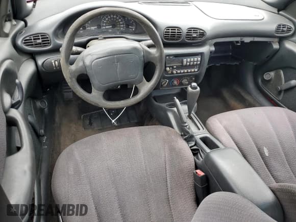 ✅ 2001 Pontiac Sunfire SE • VIN: 1G2JB524817332499 • Lot: 89281545. Wystawiony na Copart z przebiegiem 128 988 mil. Bezpłatny archiwum sprzedaży aukcyjnych z USA i szczegółowy raport historii pojazdu na DreamBid. Zdjęcie 8.