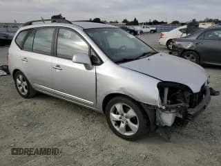 ✅ 2009 Kia Rondo LX • VIN: KNAFG528097222268 • Лот: 77797124. Опубликован ранее на Copart с пробегом 184 569 миль. Бесплатный доступ к архиву аукционных продаж из США и подробный отчёт об истории автомобиля на DreamBid. Изображение 4.