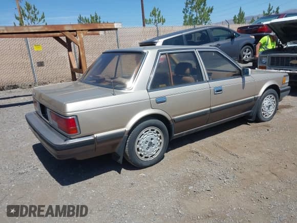 ✅ 1986 Nissan Maxima • VIN: JN1HU11S5GT145169 • Лот: 42472765. Опубликован ранее на IAAI с пробегом 173 183 миль. Бесплатный доступ к архиву аукционных продаж из США и подробный отчёт об истории автомобиля на DreamBid. Изображение 4.