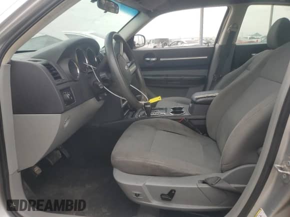 ✅ 2009 Dodge Charger SXT • VIN: 2B3KA33V89H515465 • Лот: 76531474. Размещён на Copart с пробегом 354 217 миль миль. Получите бесплатный доступ к архиву аукционных продаж из США и посмотрите подробный отчёт об истории автомобиля на DreamBid. Изображение 7.