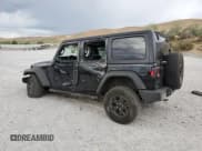 ✅ 2022 Jeep Wrangler Unlimited Willys Sport • VIN: 1C4HJXDM3NW257308 • Лот: 70138385. Опубликован ранее на Copart с пробегом 76 768 миль. Бесплатный доступ к архиву аукционных продаж из США и подробный отчёт об истории автомобиля на DreamBid. Изображение 2.