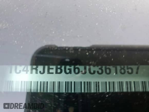 2018 Jeep Grand Cherokee Limited z VIN 1C4RJEBG6JC361857, wystawiony jako Copart lot #83971425 z przebiegiem 115 787 mil mil oraz Szkoda całkowita • Salvage title. Historia ofert i sprzedaży dostępna na DreamBid. Obrazek 13.