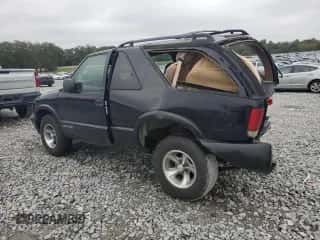 2002 Chevrolet Blazer LS z VIN 1GNCS18W32K232872, wystawiony jako Copart lot #79888924 z przebiegiem 110 591 mil mil oraz Szkoda całkowita • Salvage title. Historia ofert i sprzedaży dostępna na DreamBid. Obrazek 2.