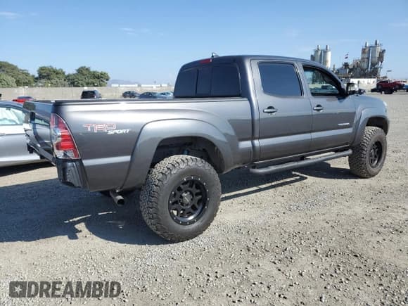 ✅ 2012 Toyota Tacoma PreRunner • VIN: 3TMKU4HN5CM031038 • Lot: 80675875. Listed on Copart with 86,117 mi. Free auction sales archive from the USA and detailed vehicle history report at DreamBid. Image 3.