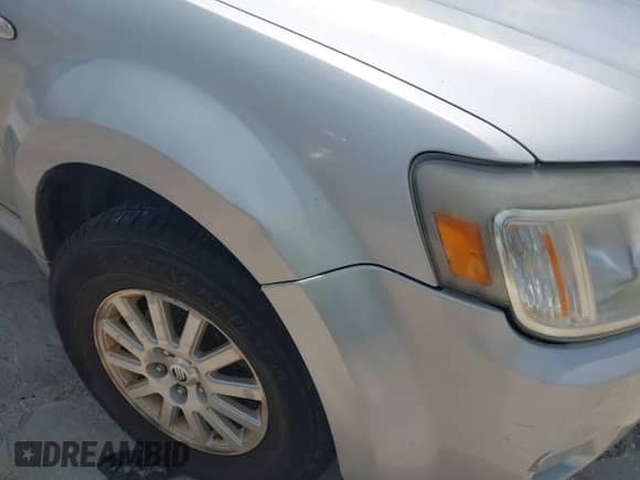 2009 Mercury Mariner Premier with VIN 4M2CU97779KJ00665, listed as a IAAI auction lot 42698060 with 162,205 mi miles and . Bid and sale history available at DreamBid. Image 6.