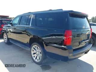 2015 Chevrolet Suburban LT z VIN 1GNSCJKC7FR142418, wystawiony jako IAAI lot #43195354 z przebiegiem 221 278 mil mil oraz . Historia ofert i sprzedaży dostępna na DreamBid. Obrazek 3.