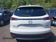 ✅ 2021 Mazda CX-9 Touring • VIN: JM3TCBCYXM0521323 • Lot: 42190976. Listed on IAAI with 56,652 mi. Free auction sales archive from the USA and detailed vehicle history report at DreamBid. Image 16.