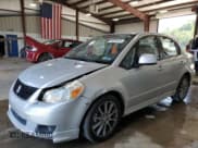 ✅ 2009 Suzuki SX4 Man Sport Touring Pkg FWD • VIN: JS2YC417X96201594 • Lot: 66200595. Listed on Copart with 173,704 mi. Free auction sales archive from the USA and detailed vehicle history report at DreamBid. Image 1.