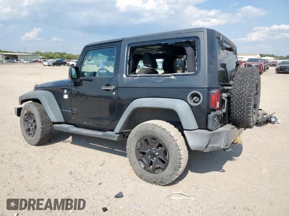 ✅ 2015 Jeep Wrangler Willys Wheeler • VIN: 1C4AJWAG7FL719463 • Лот: 85083415. Опубликован ранее на Copart с пробегом 72 295 миль. Бесплатный доступ к архиву аукционных продаж из США и подробный отчёт об истории автомобиля на DreamBid. Изображение 2.