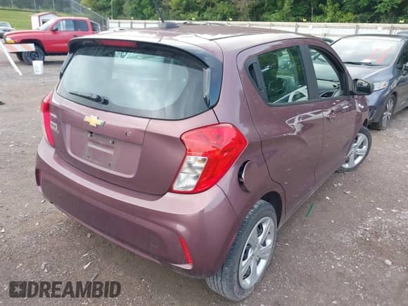 2020 Chevrolet Spark LS with VIN KL8CB6SA5LC422499, listed as a IAAI auction lot 39990447 with 56,964 mi miles and . Bid and sale history available at DreamBid. Image 4.