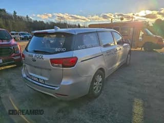 ✅ 2017 Kia Sedona L • VIN: KNDMA5C10H6264747 • Lot: 95277395. Listed on Copart with 186,984 mi. Free auction sales archive from the USA and detailed vehicle history report at DreamBid. Image 4.