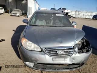 2010 Hyundai Elantra GLS z VIN KMHDU4AD8AU937618, wystawiony jako Copart lot #72166954 z przebiegiem 149 876 mil mil oraz Szkoda całkowita • Salvage title. Historia ofert i sprzedaży dostępna na DreamBid. Obrazek 5.