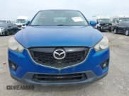 ✅ 2013 Mazda CX-5 Grand Touring • VIN: JM3KE2DE0D0100155 • Lot: 43341585. Listed on IAAI with 297,809 mi. Free auction sales archive from the USA and detailed vehicle history report at DreamBid. Image 12.