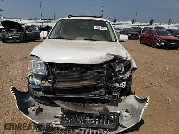 2010 Mercury Mariner Premier с VIN 4M2CN9H72AKJ24775, выставлен на аукционе Copart как лот 65381985 с пробегом 162 621 миль миль и Списание • Salvage title. История ставок и продаж доступна на DreamBid. Изображение 13.