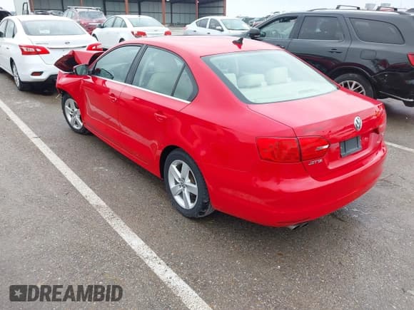 ✅ 2014 Volkswagen Jetta TDI w/Premium/Nav • VIN: 3VWLL7AJ4EM383351 • Lot: 42424074. Listed on IAAI with 66,824 mi. Free auction sales archive from the USA and detailed vehicle history report at DreamBid. Image 3.