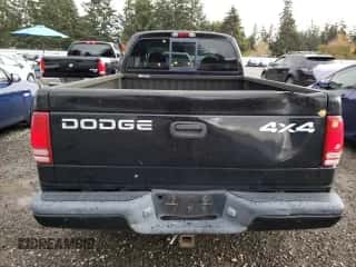 2000 Dodge Dakota Sport z VIN 1B7GG22N7YS611495, wystawiony jako Copart lot #77156084 z przebiegiem 179 247 mil mil oraz Szkoda całkowita • Salvage title. Historia ofert i sprzedaży dostępna na DreamBid. Obrazek 6.