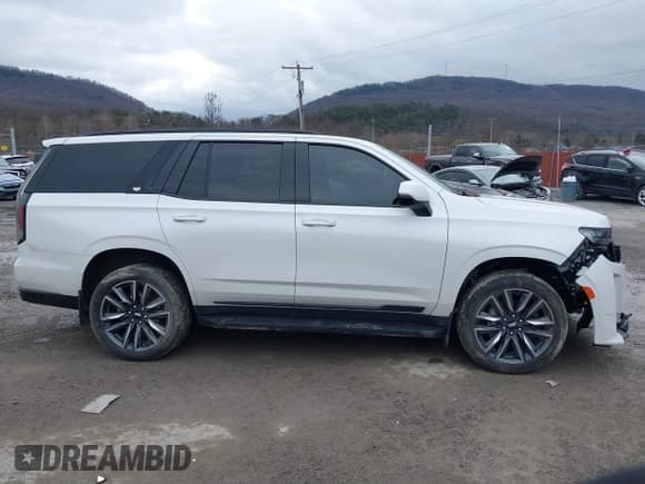 ✅ 2023 Cadillac Escalade 4WD Sport • VIN: 1GYS4EKL8PR373742 • Лот: 41109624. Опубликован ранее на IAAI с пробегом 15 776 миль. Бесплатный доступ к архиву аукционных продаж из США и подробный отчёт об истории автомобиля на DreamBid. Изображение 13.