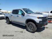 ✅ 2022 Chevrolet Silverado 1500 ZR2 • VIN: 3GCUDHEL7NG595231 • Lot: 66732355. Wystawiony na Copart z przebiegiem 60 374 mil. Bezpłatny archiwum sprzedaży aukcyjnych z USA i szczegółowy raport historii pojazdu na DreamBid. Zdjęcie 4.