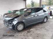 ✅ 2010 Honda Odyssey LX • VIN: 5FNRL3H24AB059836 • Lot: 43704388. Listed on IAAI with 140,336 mi. Free auction sales archive from the USA and detailed vehicle history report at DreamBid. Image 2.