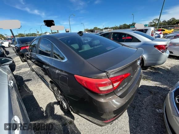 ✅ 2015 Hyundai Sonata Sport • VIN: 5NPE34AF5FH021249 • Lot: 92726805. Listed on Copart with 140,395 mi. Free auction sales archive from the USA and detailed vehicle history report at DreamBid. Image 3.