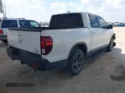 ✅ 2023 Honda Ridgeline RTL-E • VIN: 5FPYK3F72PB035287 • Lot: 43234228. Listed on IAAI with 15,634 mi. Free auction sales archive from the USA and detailed vehicle history report at DreamBid. Image 4.