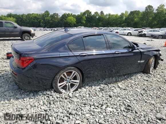 ✅ 2014 BMW 7 Series 740i • VIN: WBAYA6C57ED826660 • Lot: 59566945. Listed on Copart with 95,828 mi. Free auction sales archive from the USA and detailed vehicle history report at DreamBid. Image 3.