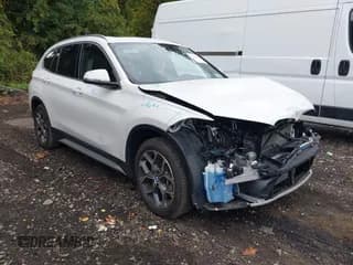 ✅ 2022 BMW X1 xDrive28i • VIN: WBXJG9C0XN5V37052 • Lot: 43208428. Listed on IAAI with 65,298 mi. Free auction sales archive from the USA and detailed vehicle history report at DreamBid. Image 1.